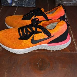 Boys slip on Nike running shoes